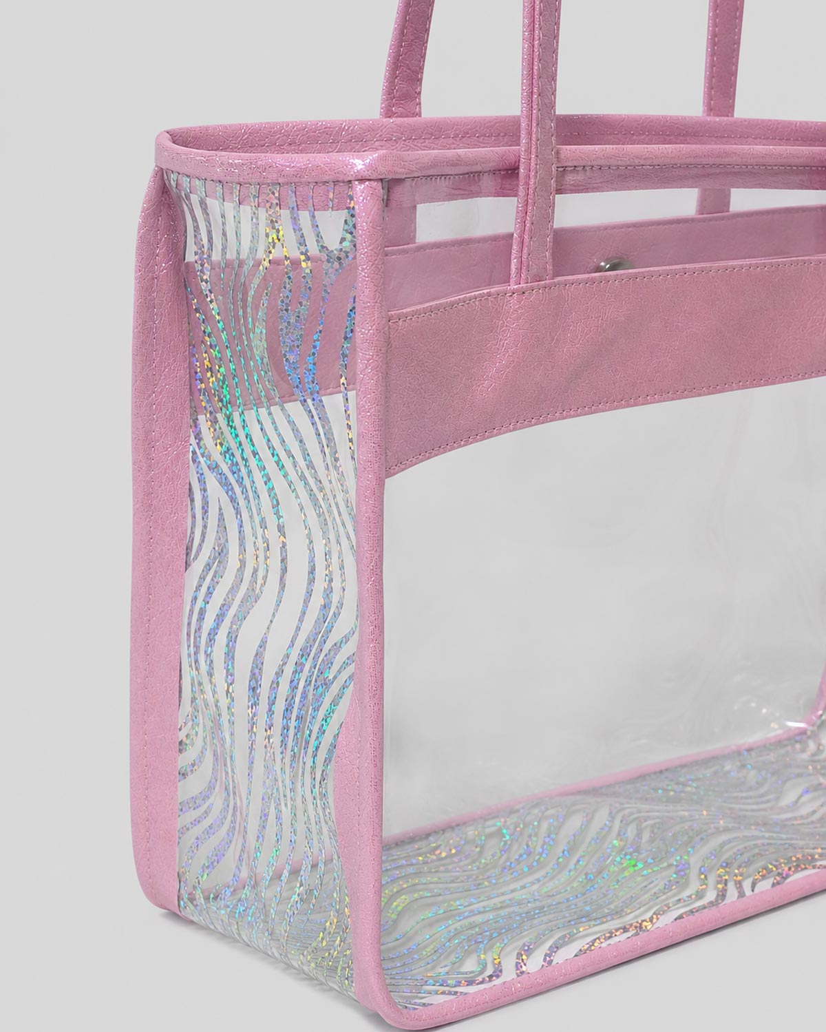 Bolso transparente con detalles tornasol para niña
