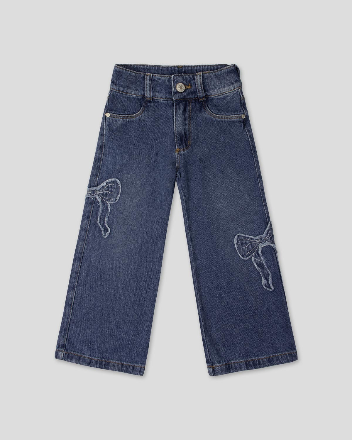 Jean denim con detalle de moños para niña