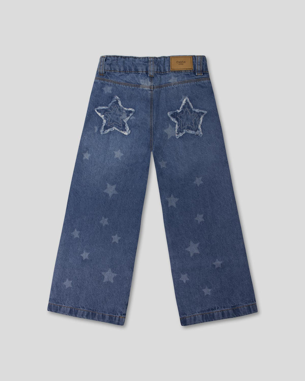 Jean denim marine fit con estrellas para niña