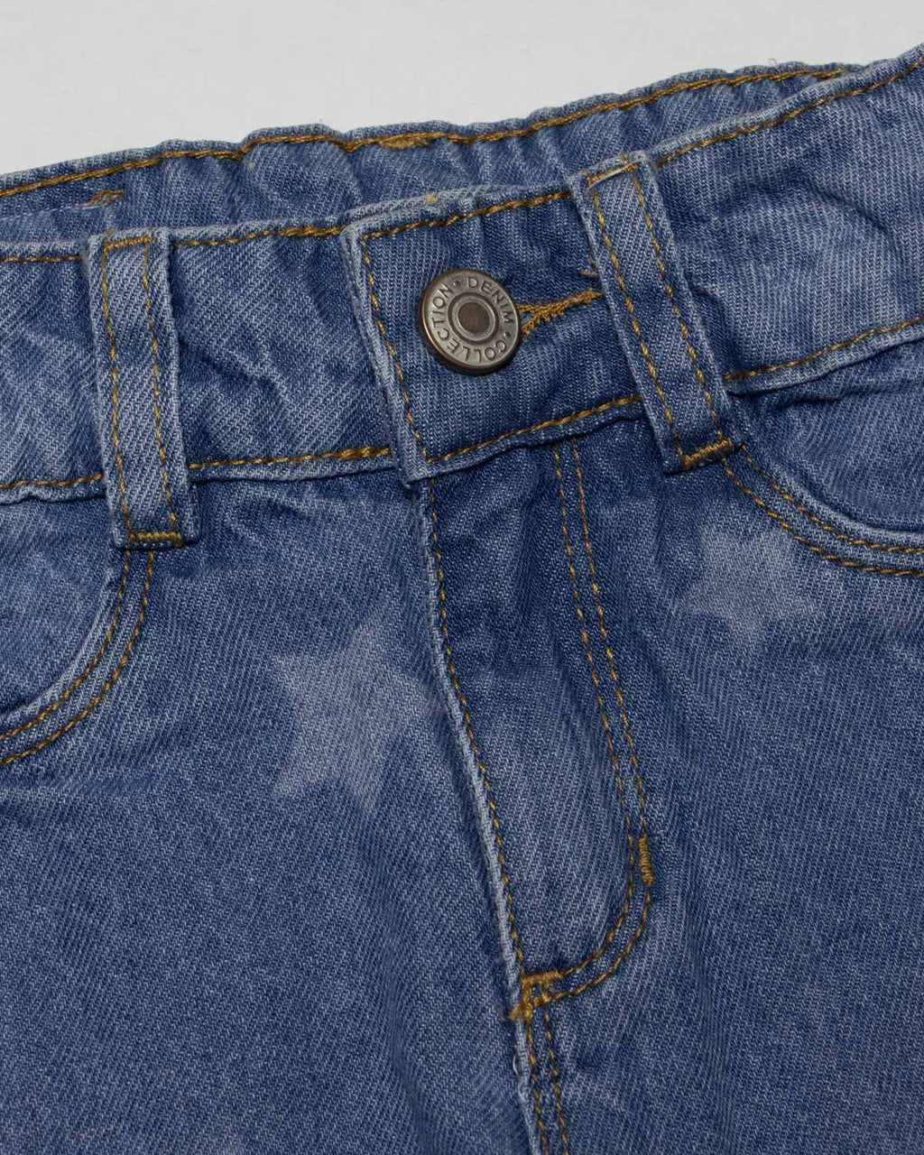 Jean denim marine fit con estrellas para niña
