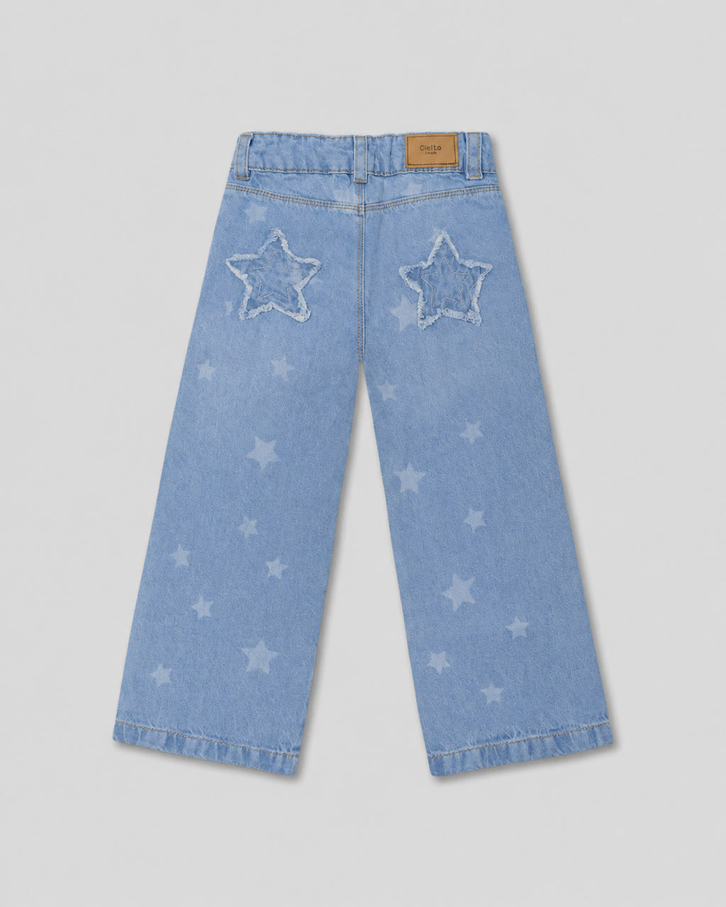 Jean denim marine fit con estrellas para niña